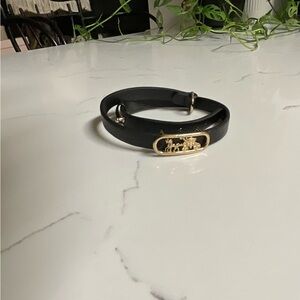 Coach black & Gold leather wrap bracelet with emblem